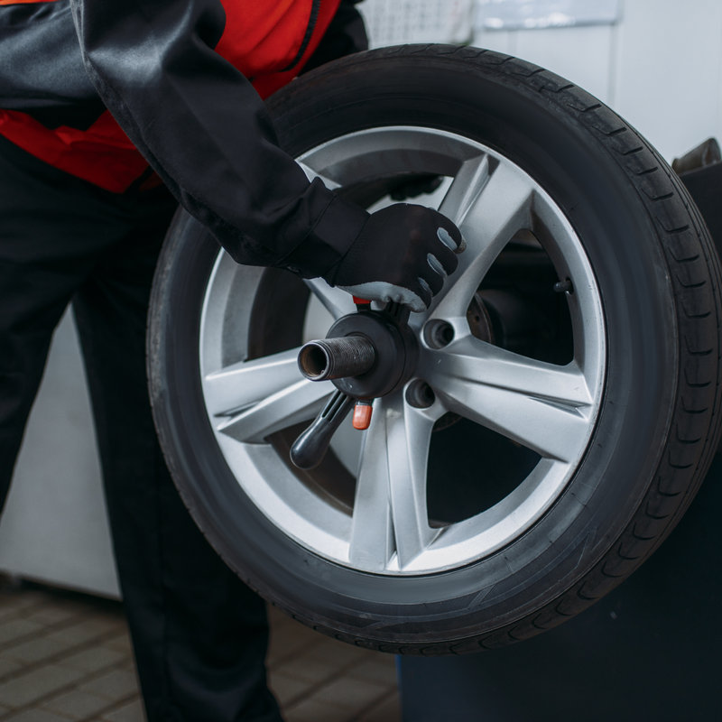 tire being removed from a vehicle